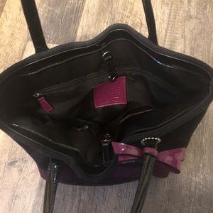 Black and dusty rose colored coach bag